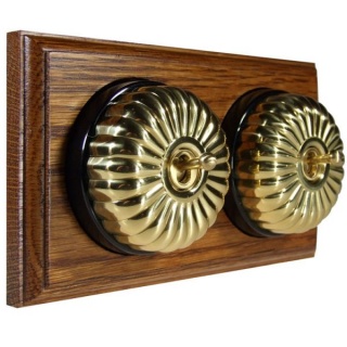 2 Gang 2 Way Polished Brass Fluted Dome with Black Pattress Horizontal Med Oak Base